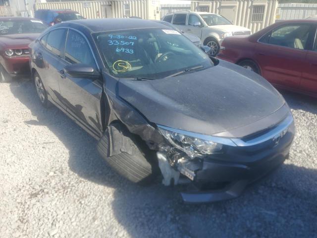 HONDA CIVIC LX 2018 with VIN 2HGFC2F59JH566933 - Photo from auction