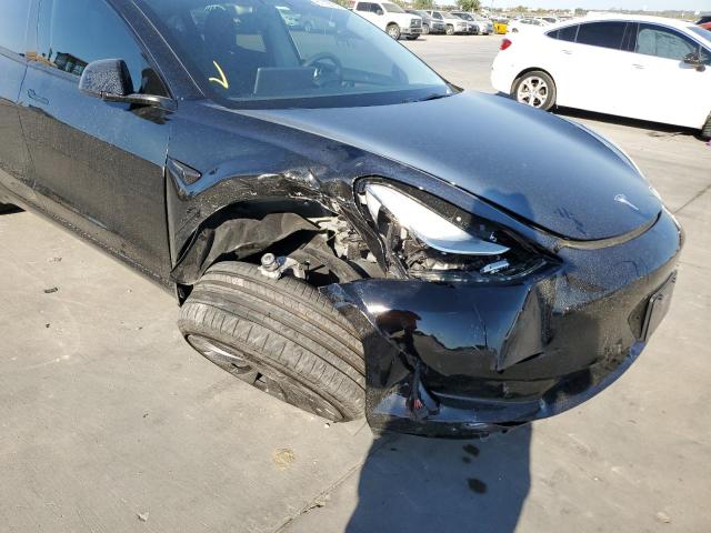 Photo 9 from auction – 2021 TESLA MODEL 3 with VIN 5YJ3E1EC8MF087323