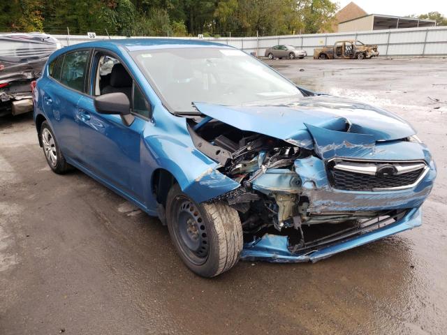 SUBARU IMPREZA 2018 with VIN 4S3GTAA64J3705575 - Photo from auction
