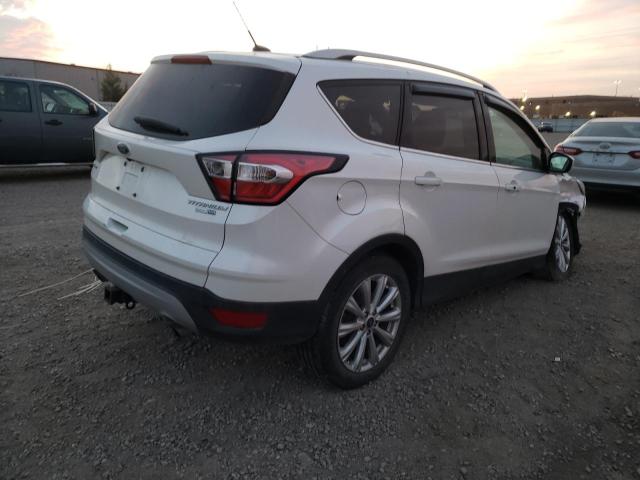 Photo 4 from auction – 2017 FORD ESCAPE TIT with VIN 1FMCU9J97HUD11699