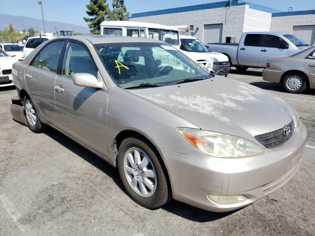 TOYOTA CAMRY LE 2003 with VIN 4T1BF32K93U049374 - Photo from auction