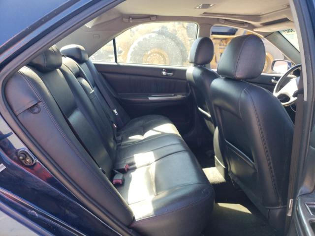 Photo 6 from auction – 2002 TOYOTA CAMRY LE with VIN 4T1BF30KX2U503763