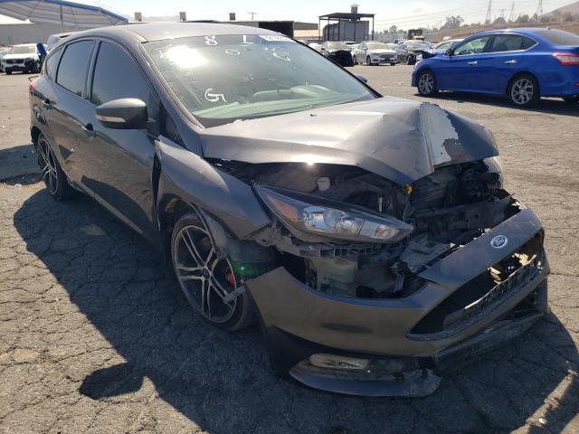 FORD FOCUS ST 2018 with VIN 1FADP3L95JL282912 - Photo from auction