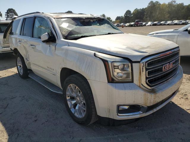 GMC YUKON SLT 2015 with VIN 1GKS2BKC4FR663201 - Photo from auction