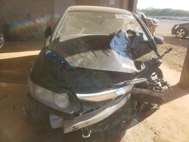 Photo 7 from auction – 2011 HONDA CIVIC LX with VIN 19XFA1F5XBE033355