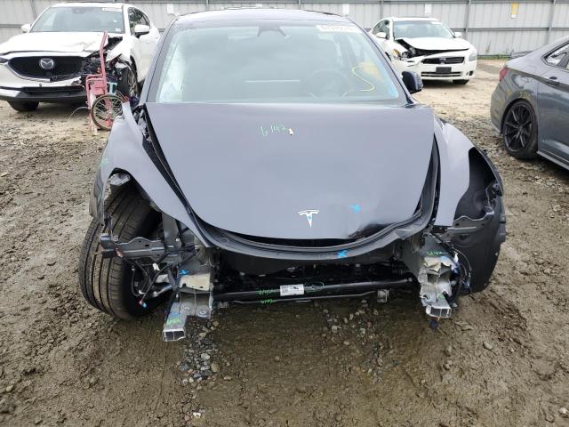 Photo 9 from auction – 2022 TESLA MODEL 3 with VIN 5YJ3E1EA1NF235831