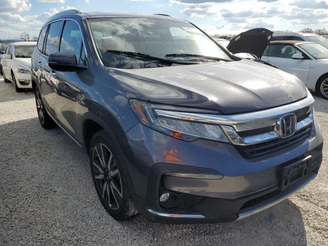 HONDA PILOT TOUR 2019 with VIN 5FNYF6H63KB076510 - Photo from auction