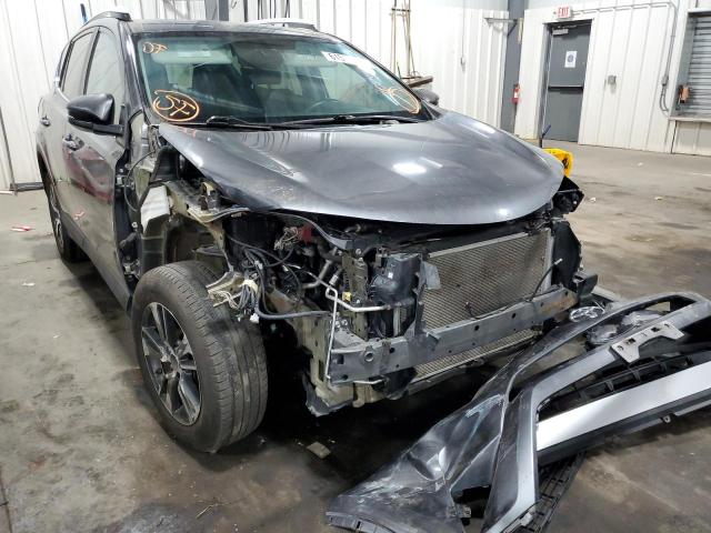 Photo 9 from auction – 2016 TOYOTA RAV4 XLE with VIN 2T3RFREV7GW412047