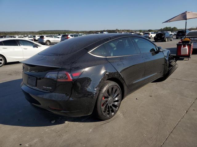 Photo 4 from auction – 2021 TESLA MODEL 3 with VIN 5YJ3E1EC8MF087323