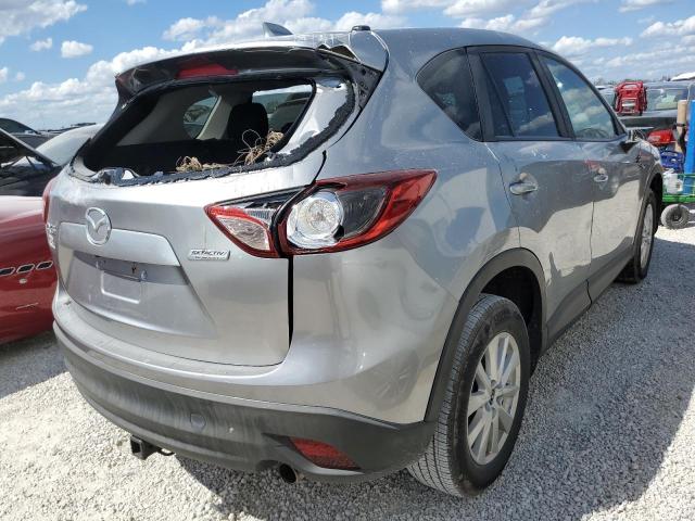 Photo 4 from auction – 2014 MAZDA CX-5 TOURI with VIN JM3KE2CY2E0311547