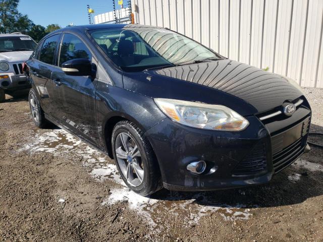 FORD FOCUS SE 2014 with VIN 1FADP3F21EL127097 - Photo from auction