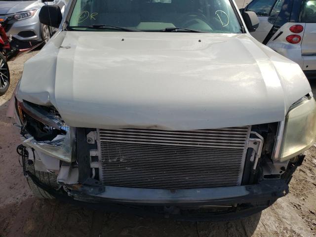 Photo 7 from auction – 2009 MERCURY MARINER with VIN 4M2CU81709KJ02275