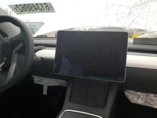 Photo 9 from auction – 2021 TESLA MODEL Y with VIN 5YJYGDEE7MF228952