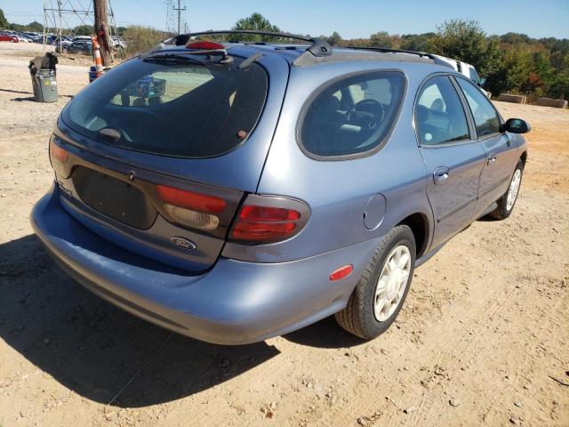 Photo 4 from auction – 1999 FORD TAURUS SE with VIN 1FAFP58UXXA305929