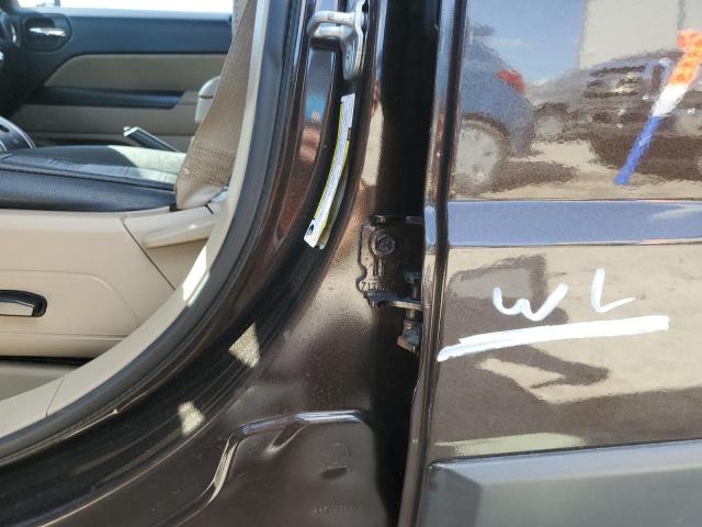Photo 9 from auction – 2014 JEEP PATRIOT LA with VIN 1C4NJPFA2ED680527