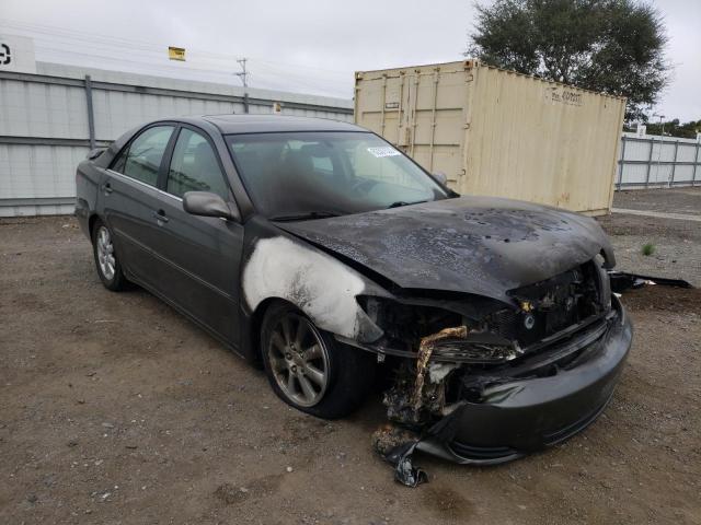 TOYOTA CAMRY LE 2002 with VIN JTDBF30K520012139 - Photo from auction