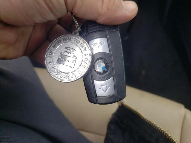 Photo 7 from auction – 2010 BMW 128 I with VIN WBAUL7C52AVJ78325