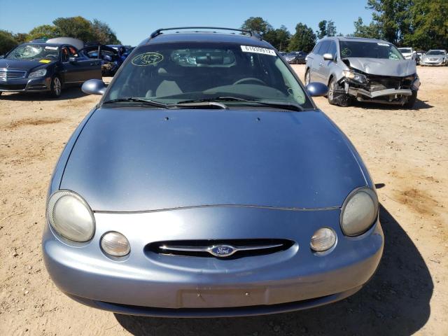 Photo 9 from auction – 1999 FORD TAURUS SE with VIN 1FAFP58UXXA305929