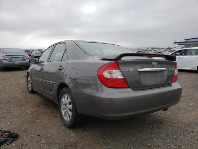 Photo 3 from auction – 2002 TOYOTA CAMRY LE with VIN JTDBF30K520012139