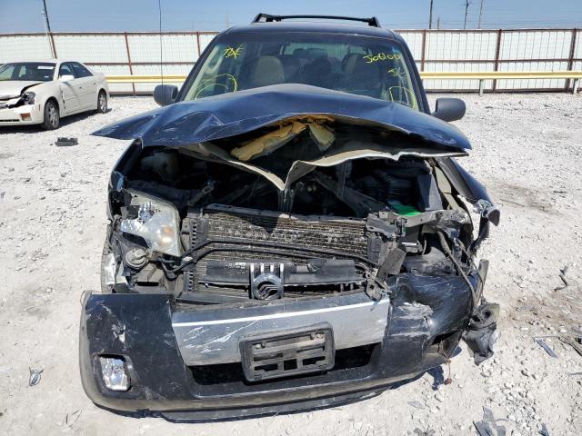 Photo 9 from auction – 2006 MERCURY MARINER with VIN 4M2YU56156DJ08100
