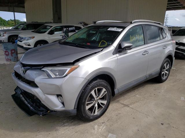 Photo 2 from auction – 2016 TOYOTA RAV4 XLE with VIN 2T3WFREV7GW290793