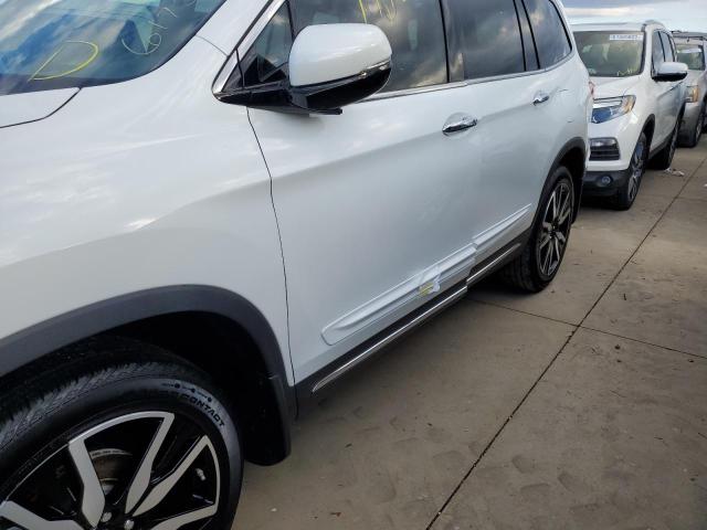 Photo 9 from auction – 2021 HONDA PILOT TOUR with VIN 5FNYF5H9XMB039364