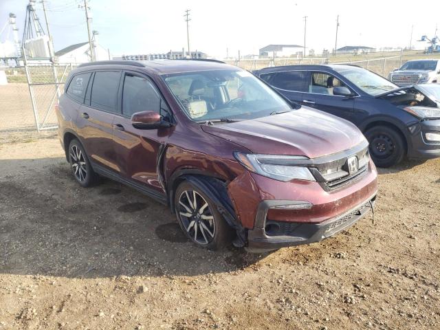 HONDA PILOT TOUR 2021 with VIN 5FNYF6H94MB505666 - Photo from auction