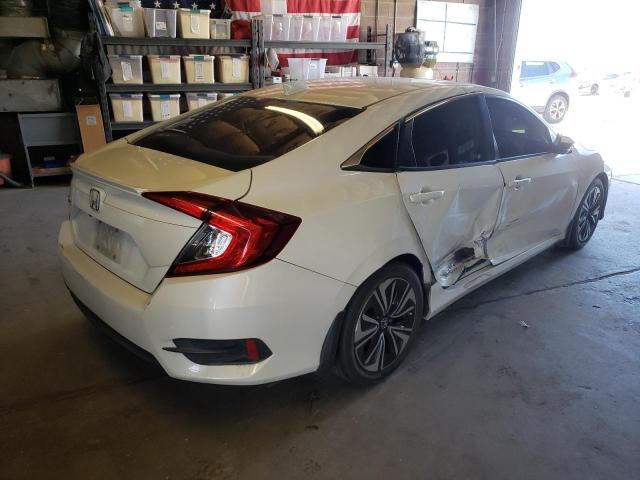 Photo 4 from auction – 2016 HONDA CIVIC EX with VIN 2HGFC1F39GH634195