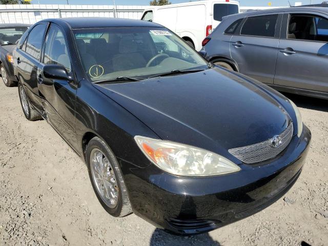 TOYOTA CAMRY LE 2002 with VIN 4T1BF32K72U026884 - Photo from auction