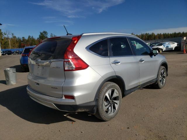 Photo 4 from auction – 2016 HONDA CR-V TOURI with VIN 5J6RM4H99GL809618
