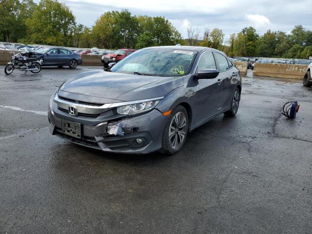 Photo 2 from auction – 2016 HONDA CIVIC EX with VIN 2HGFC1F39GH659050
