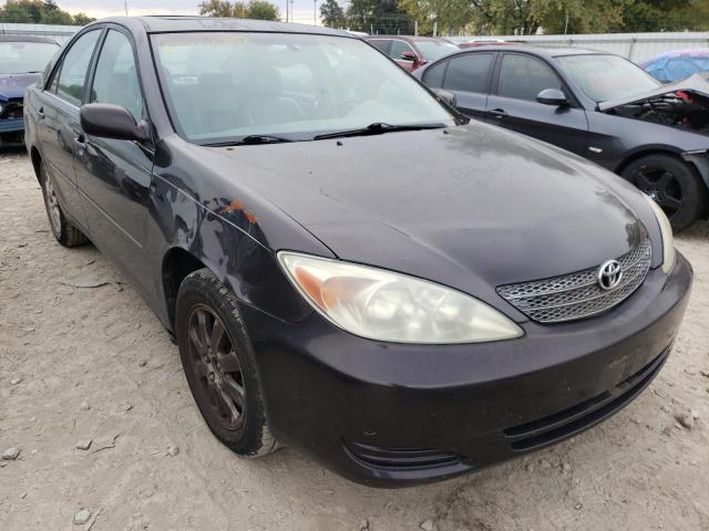 TOYOTA CAMRY LE 2002 with VIN 4T1BF30K12U504588 - Photo from auction