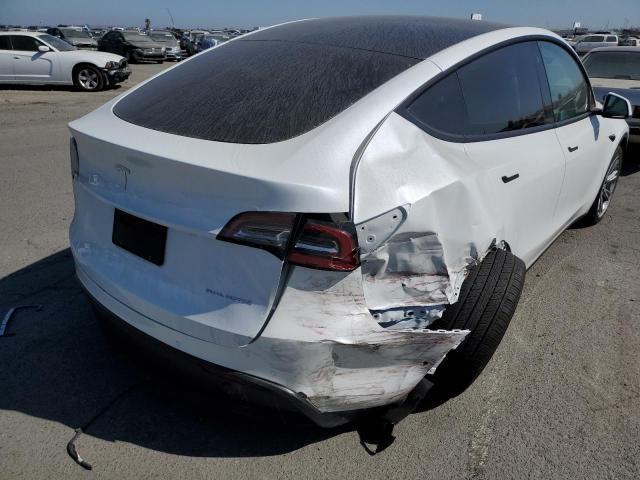 Photo 9 from auction – 2022 TESLA MODEL Y with VIN 7SAYGDEE3NF355685