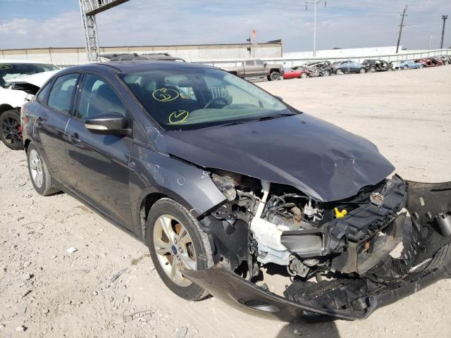 FORD FOCUS SE 2014 with VIN 1FADP3F20EL129472 - Photo from auction