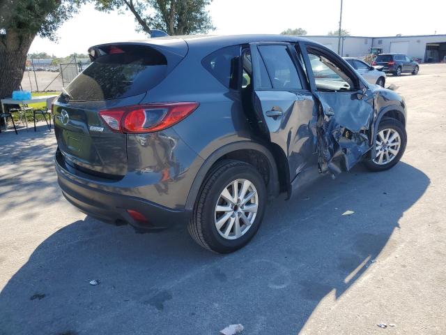 Photo 4 from auction – 2014 MAZDA CX-5 TOURI with VIN JM3KE2CY9E0324330