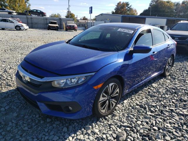 Photo 2 from auction – 2017 HONDA CIVIC EX with VIN 2HGFC1F45HH635354