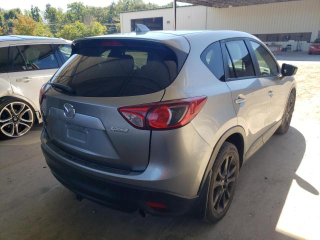 Photo 4 from auction – 2013 MAZDA CX-5 GT with VIN JM3KE2DE3D0125051
