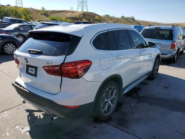 Photo 4 from auction – 2016 BMW X1 XDRIVE2 with VIN WBXHT3C31GP881653