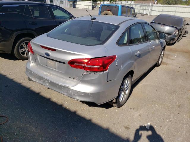 Photo 4 from auction – 2015 FORD FOCUS SE with VIN 1FADP3F27FL205884