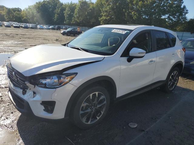 Photo 2 from auction – 2016 MAZDA CX-5 GT with VIN JM3KE4DY0G0890163