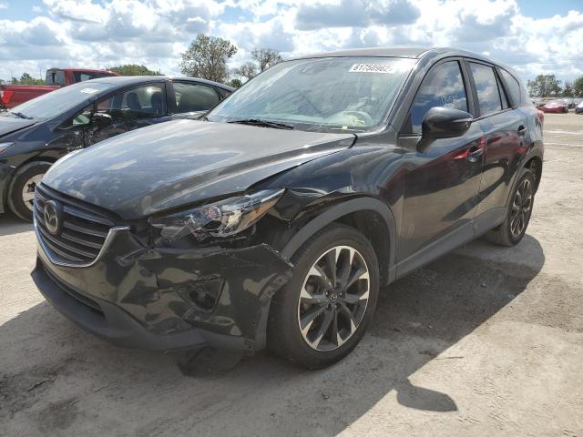 Photo 2 from auction – 2016 MAZDA CX-5 GT with VIN JM3KE2DY0G0851786