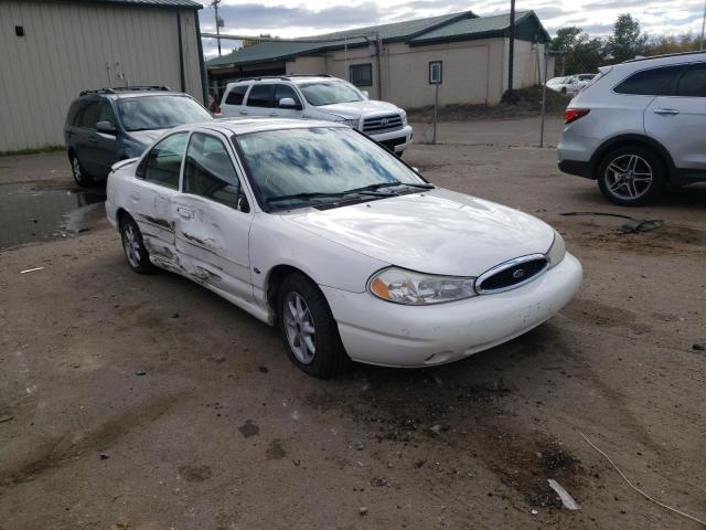 FORD CONTOUR 1999 with VIN 1FAFP66L3XK172957 - Photo from auction