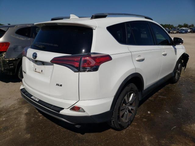 Photo 4 from auction – 2017 TOYOTA RAV4 XLE with VIN JTMWFREV5HJ138317