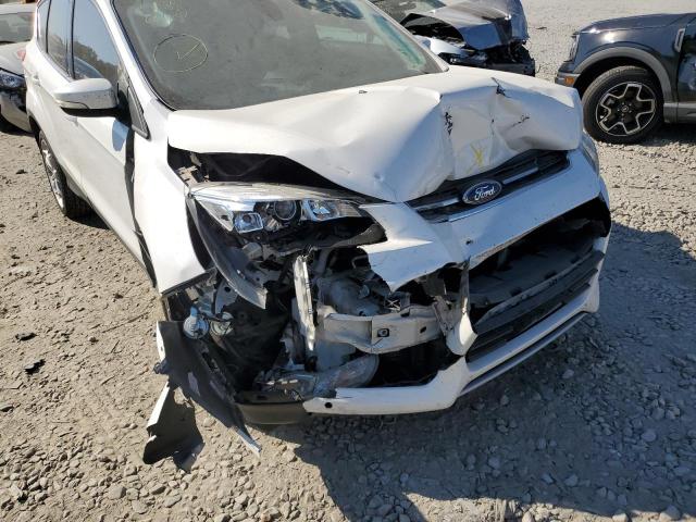 Photo 9 from auction – 2016 FORD ESCAPE TIT with VIN 1FMCU0J91GUB89111