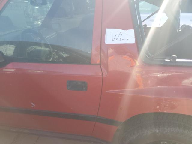 Photo 9 from auction – 1998 CHEVROLET TRACKER with VIN 2CNBE186XW6902644