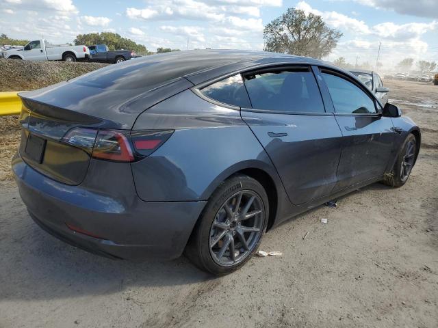 Photo 4 from auction – 2021 TESLA MODEL 3 with VIN 5YJ3E1EA0MF851700