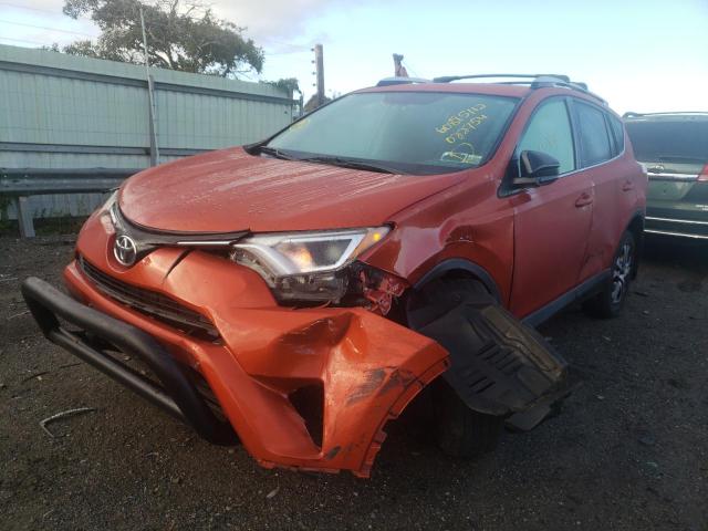 Photo 2 from auction – 2016 TOYOTA RAV4 LE with VIN JTMBFREV2GJ082754