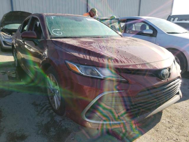 TOYOTA CAMRY LE 2022 with VIN 4T1C11AK0NU654413 - Photo from auction