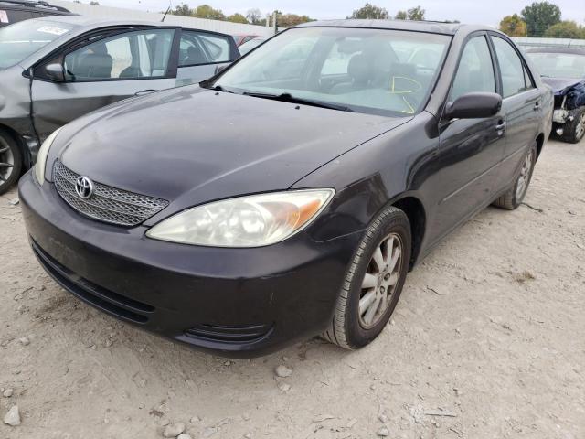 Photo 2 from auction – 2002 TOYOTA CAMRY LE with VIN 4T1BF30K12U504588