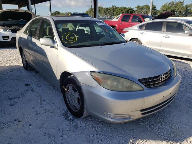 TOYOTA CAMRY LE 2002 with VIN 4T1BF32K72U536538 - Photo from auction